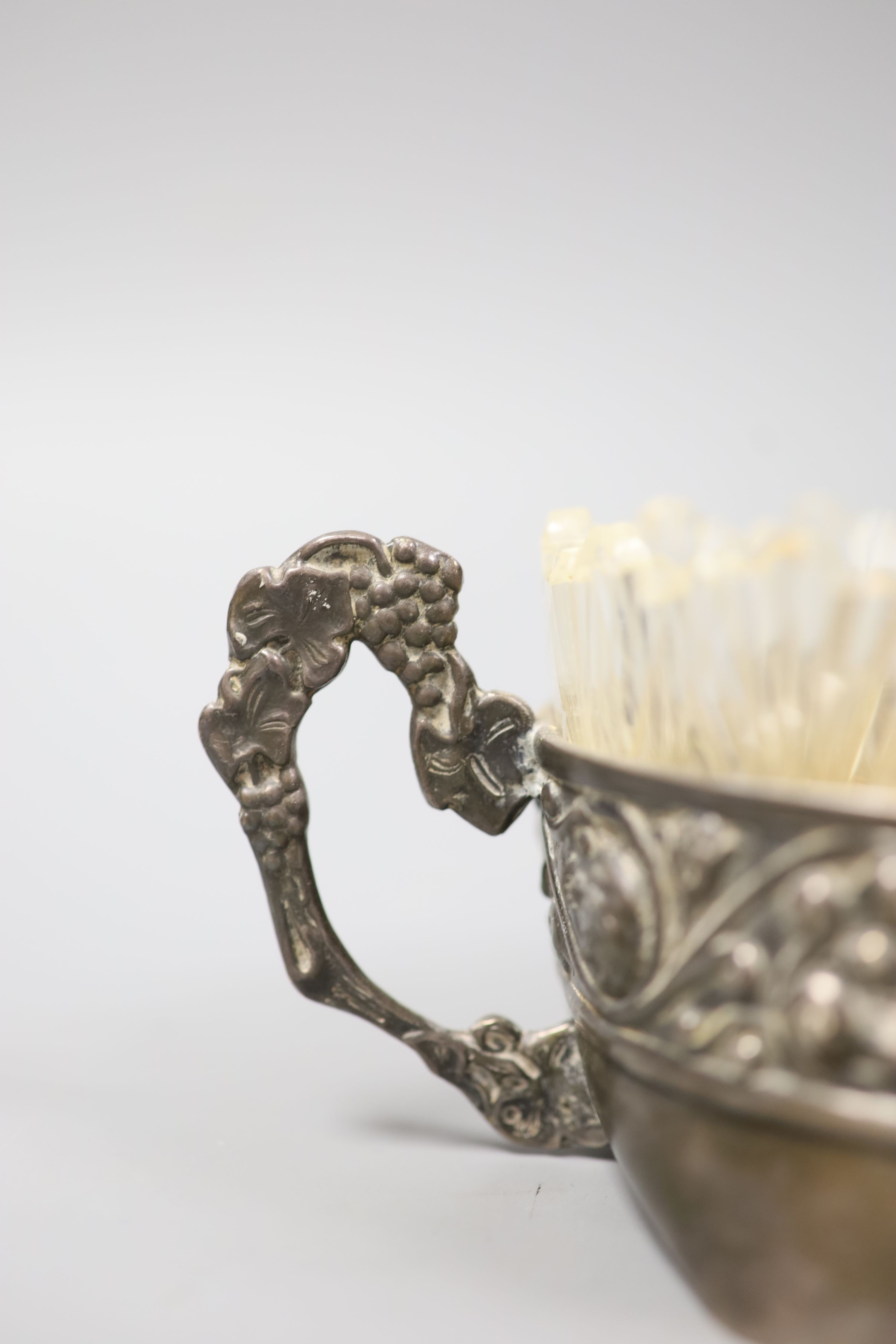 An early 20th century Russian white metal two handled oval dish with glass liner